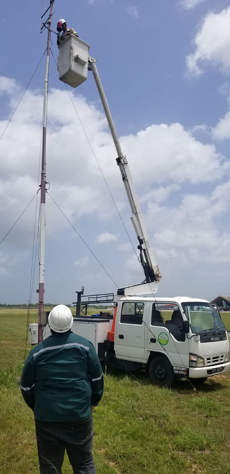 BELEC bucket truck with a linesman working at height