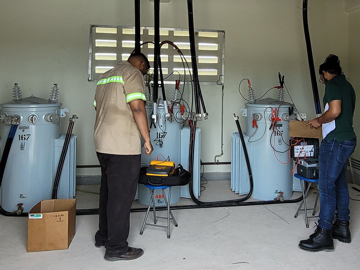 BELEC engineers testing pole type transformers