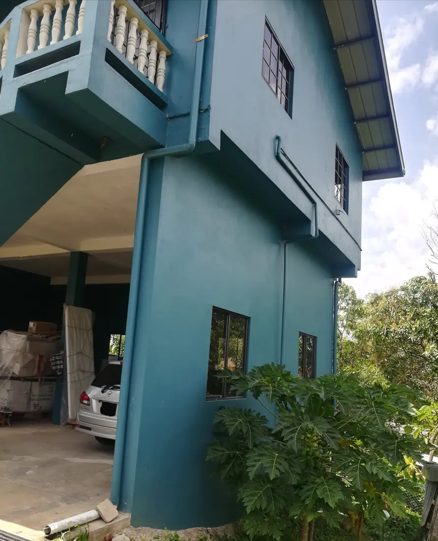 Teal two-storey exterior