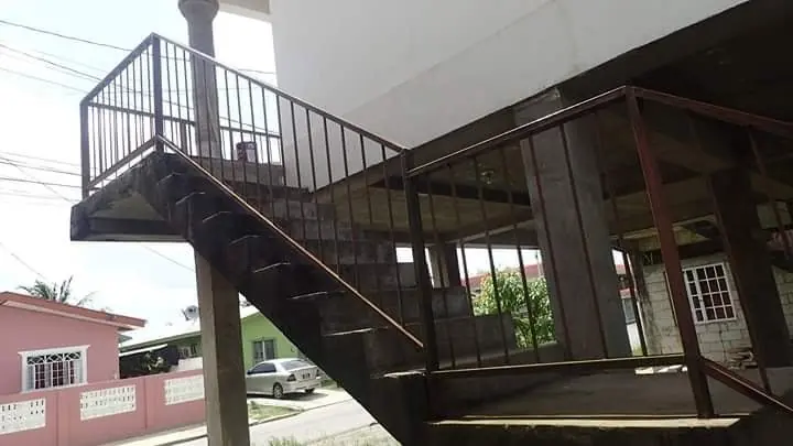 Stairs and rails painted in dark brown